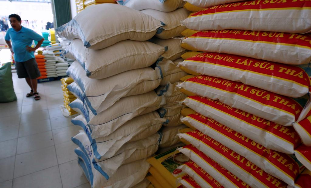 Asia Rice - Vietnam export rates rise as floods and landslides hit supply